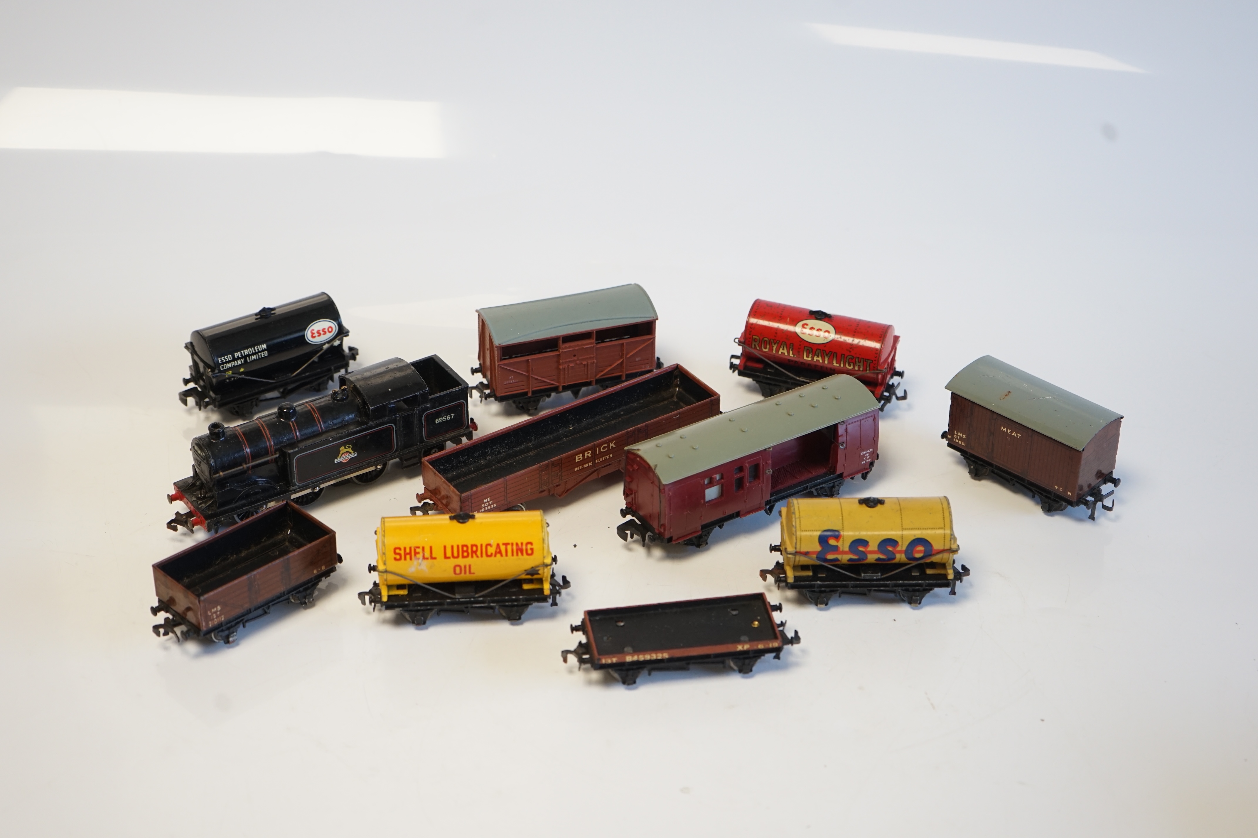 A quantity of Hornby Dublo model railway for 3-rail running including; a BR Class N2 0-6-2T locomotive, eight tinplate bogie coaches, 25 freight wagons, two track sections for the Royal Mail TPO set, and a large quantity